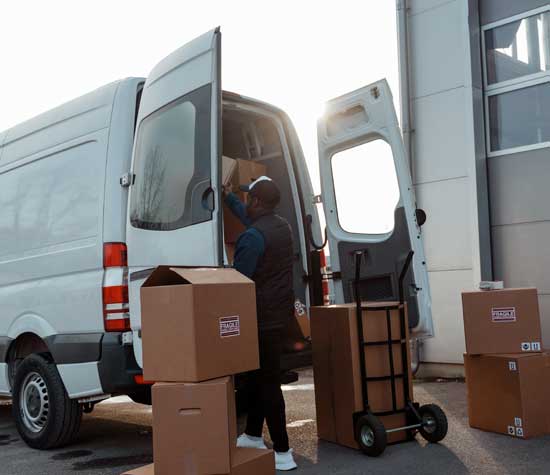 man unloading a delivery truck