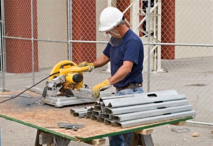 man working at saw