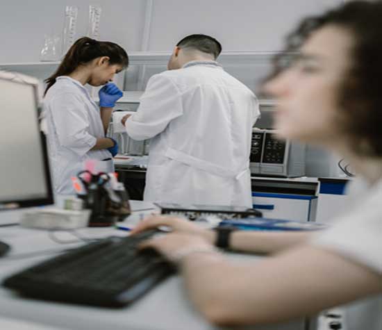 3 lab workers in the lab