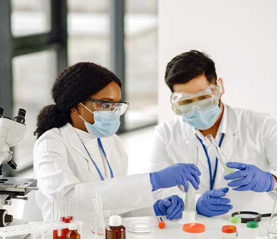 two workers training in a lab